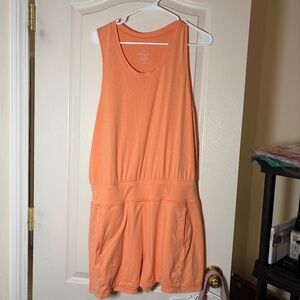 Sweaty Betty orange Gary sleeveless athletic romper. Sz Large.